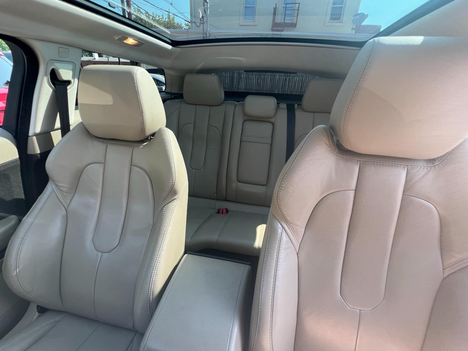 2013 /Beige Land Rover Range Rover Evoque Pure Plus 3-Door (SALVP1BG3DH) with an 2.0L L4 DOHC 24V TURBO engine, 6-Speed Automatic transmission, located at 1018 Brunswick Ave, Trenton, NJ, 08638, (609) 989-0900, 40.240086, -74.748085 - This Range Rover Evoque is beautiful in every way and has been very well maintained and ready for the next owner! Amazing color combo and super clean SUV! Call Anthony to set up an appointment ASAP, 609-273-5100 - Photo #10